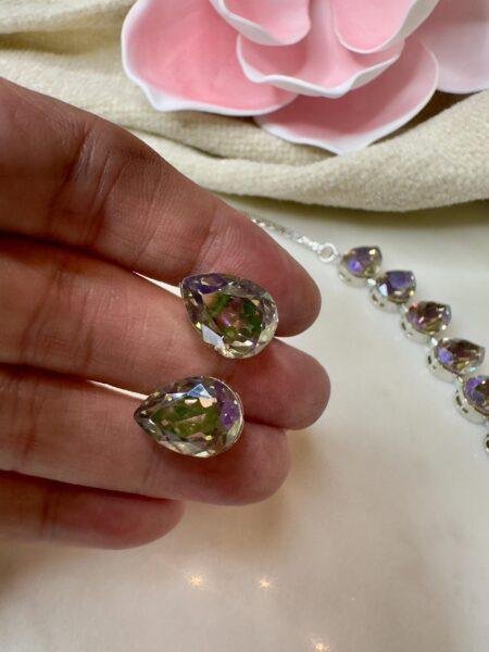 beautifully crafted Sworaski crystals necklace set with studs/wedding /silver plated/rhodium finish adjustable.