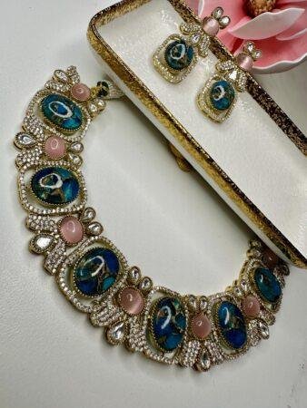 Bollywood ethnic Indian golden  a finish  marble stone with ad /kundan stone, designer blue color with pink accent stones