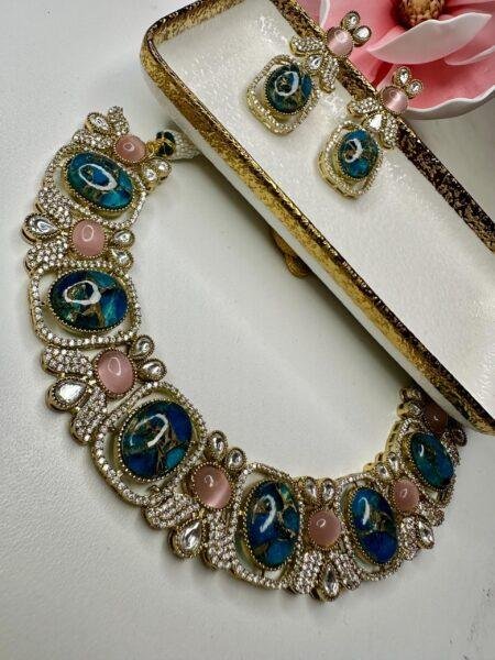 Bollywood ethnic Indian golden  a finish  marble stone with ad /kundan stone, designer blue color with pink accent stones