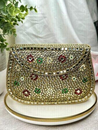 Gold Kundan metal Bag with multi Stone Embellishments - Perfect for Weddings and Formal Events