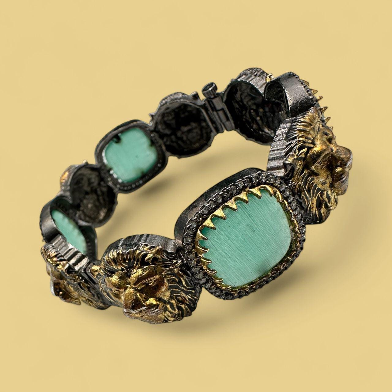 Sabya Openable Bangle Chunky | Lion Motif Gold & Silver with Mint Green Stones - Image 2